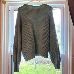 Large blue cotton sweater.